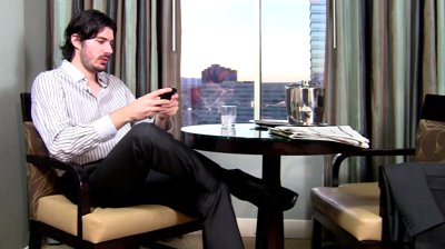 stock-footage-young-professional-texting-in-hotel-room-hd